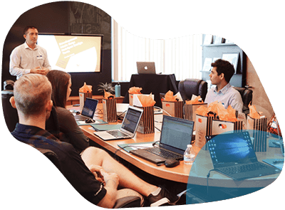 A Team Listening to a Presentation in a Conference Room